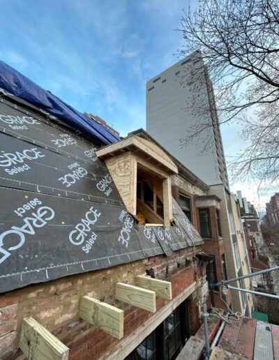 The roof of a building is under construction.