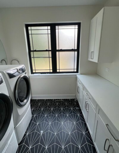 A laundry room with a washer and dryer.